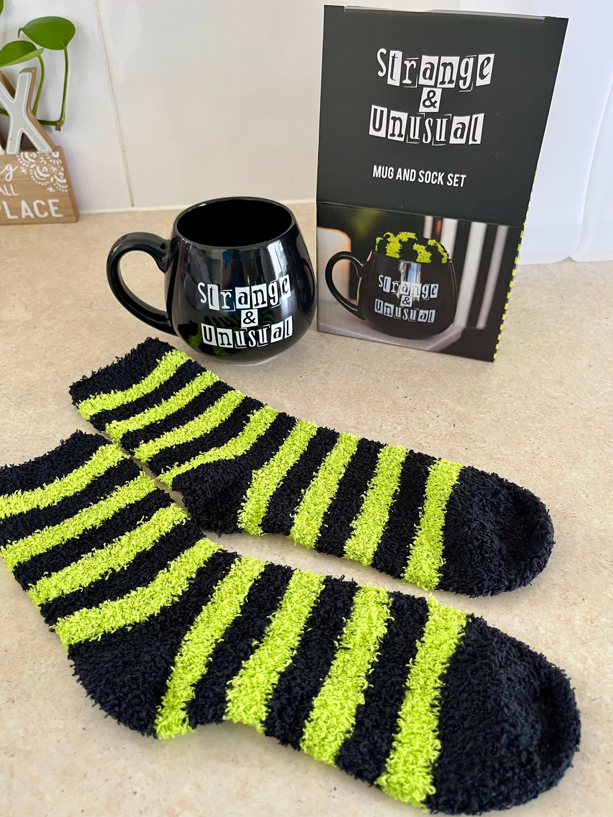 Black and White 'Strange and Unusual" Witchy Goth Mug with Yellow and Black Stripey Socks