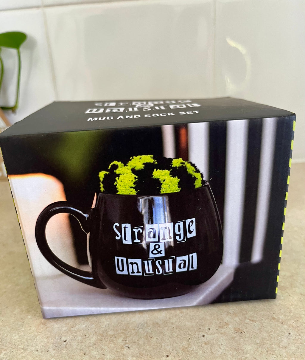 Black and White 'Strange and Unusual" Witchy Goth Mug with Yellow and Black Stripey Socks