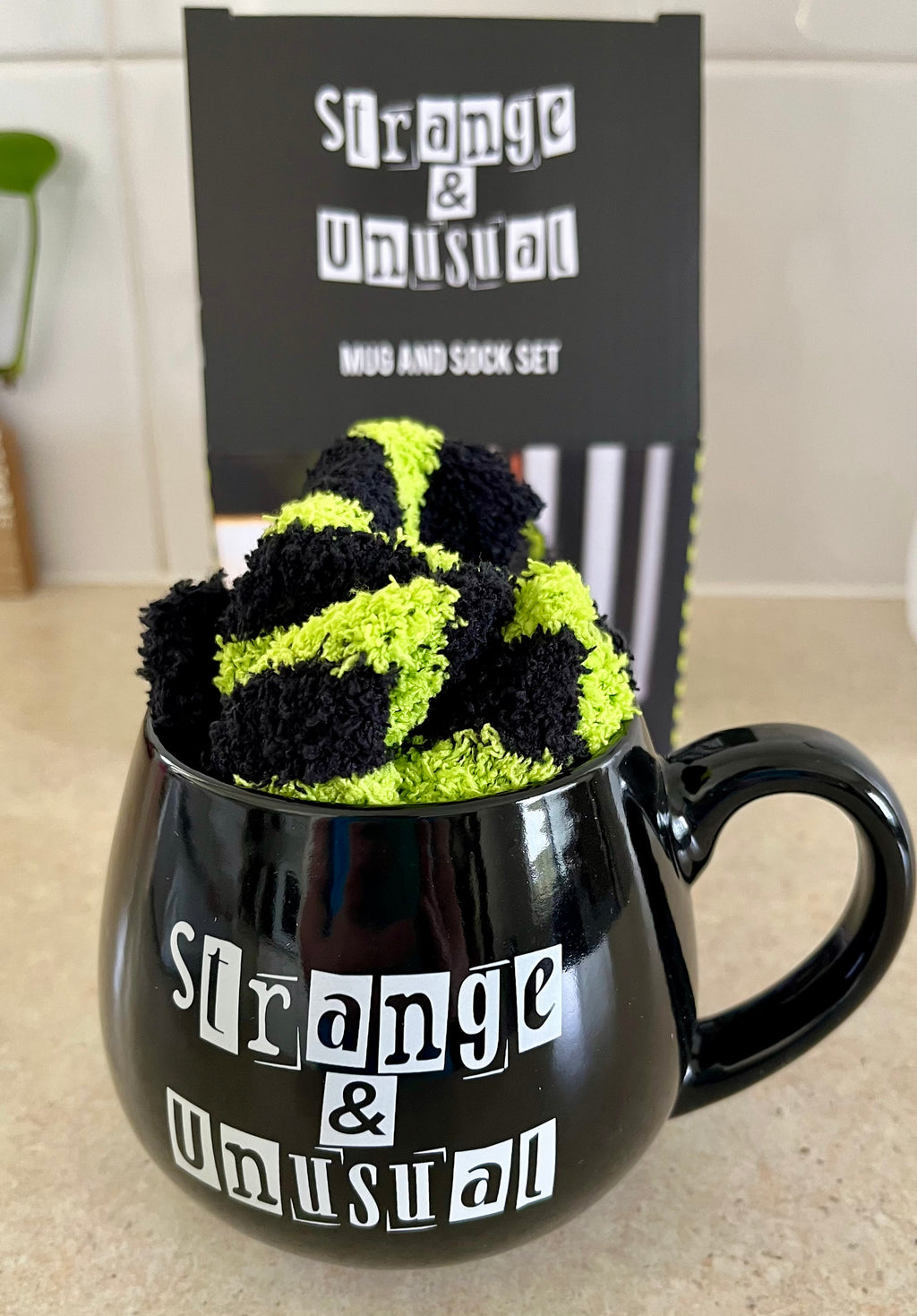 Black and White 'Strange and Unusual" Witchy Goth Mug with Yellow and Black Stripey Socks